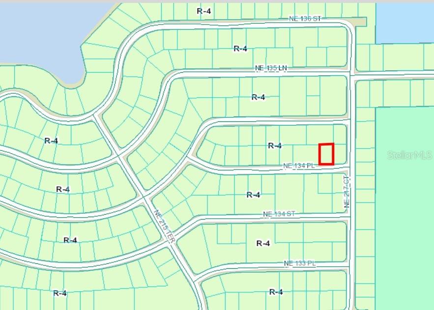 This is a map showing a residential lot highlighted in red within a neighborhood — NE 134 PL, SALT SPRINGS, FL