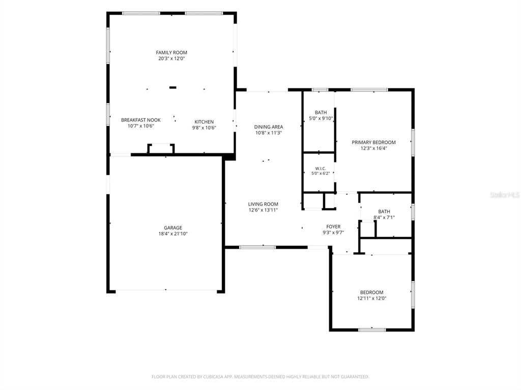 This is a floor plan showing a single-story home with a garage and two bedrooms — 4636 ACKERMAN STREET, NEW PORT RICHEY, FL