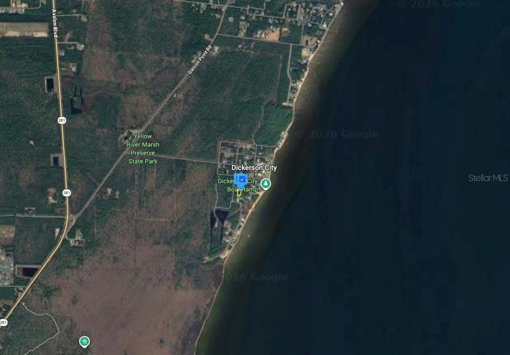 This is a satellite map view of the Dickerson City area and surrounding coastline — 6339 GREY HERON DRIVE, MILTON, FL