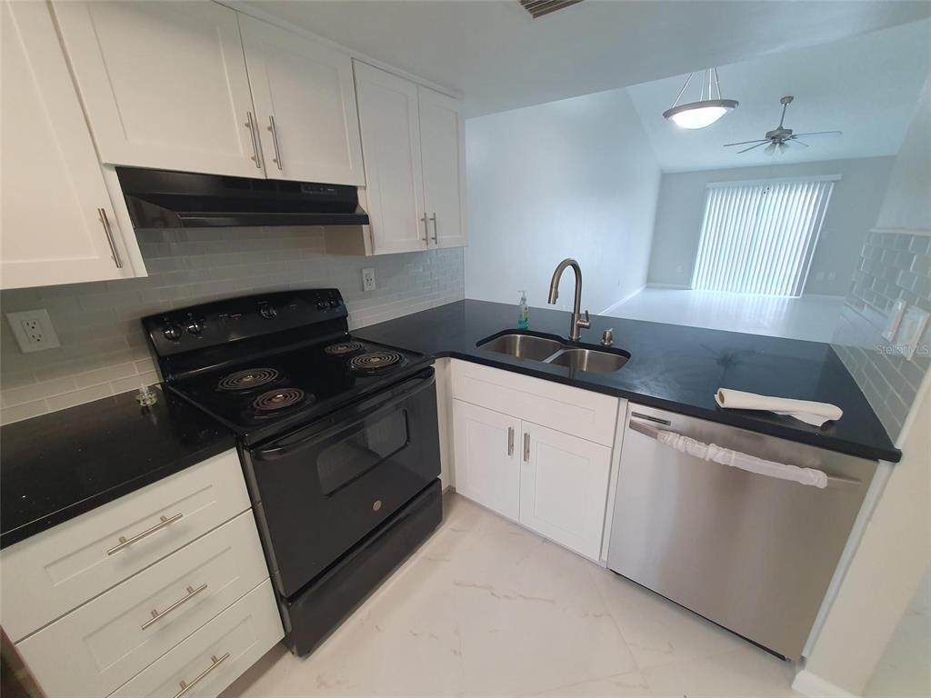 1829 ORANGE BOULEVARD WAY, PALM HARBOR, FL — photo 4 of 11