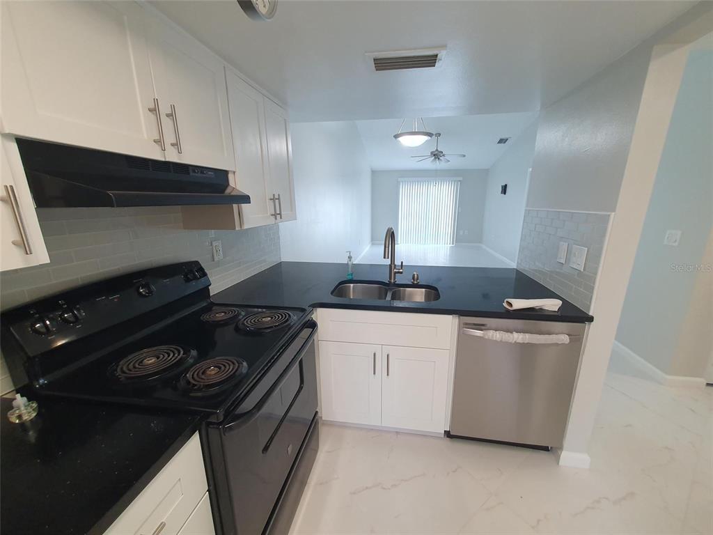 1829 ORANGE BOULEVARD WAY, PALM HARBOR, FL — photo 5 of 11