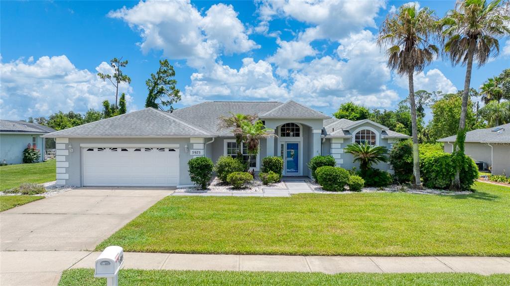 5975 SAWGRASS POINT DRIVE