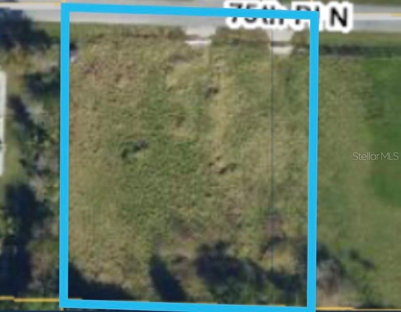 An aerial view shows a rectangular vacant lot outlined in blue along a paved road — 17892 75TH PLACE N, LOXAHATCHEE, FL