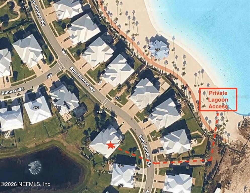 This is an aerial map showing residential houses and a private lagoon access path — 244 RUM RUNNER WAY, ST JOHNS, FL