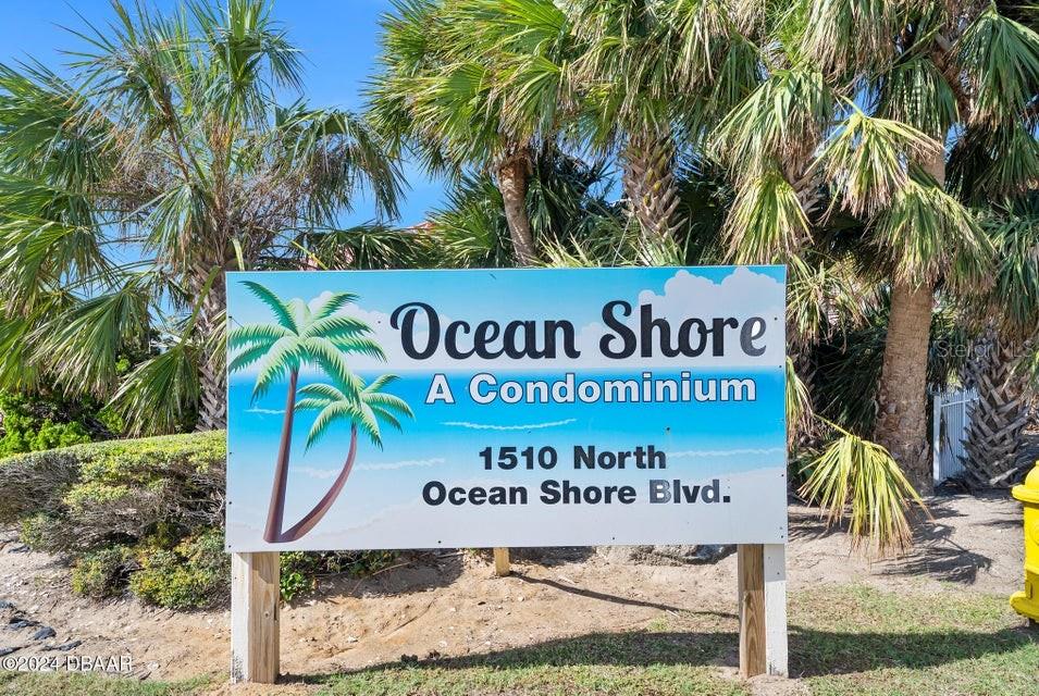 A sign for Ocean Shore A Condominium stands in front of palm trees — 1510 OCEAN SHORE BOULEVARD UNIT 3150, ORMOND BEACH, FL