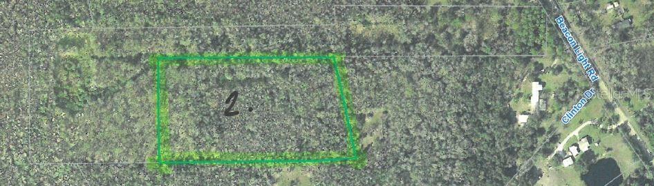 An aerial map view shows a rectangular plot of land outlined in green — 0 BEACON LIGHT ROAD, EDGEWATER, FL