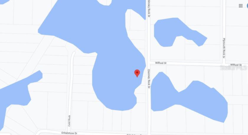 This is a map showing a red location pin situated within a body of water — CHIMNEY ROCK DRIVE, WEBSTER, FL