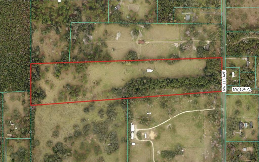 This is an aerial map showing a rectangular parcel of land outlined in red — 10550 NW 115TH AVENUE, REDDICK, FL