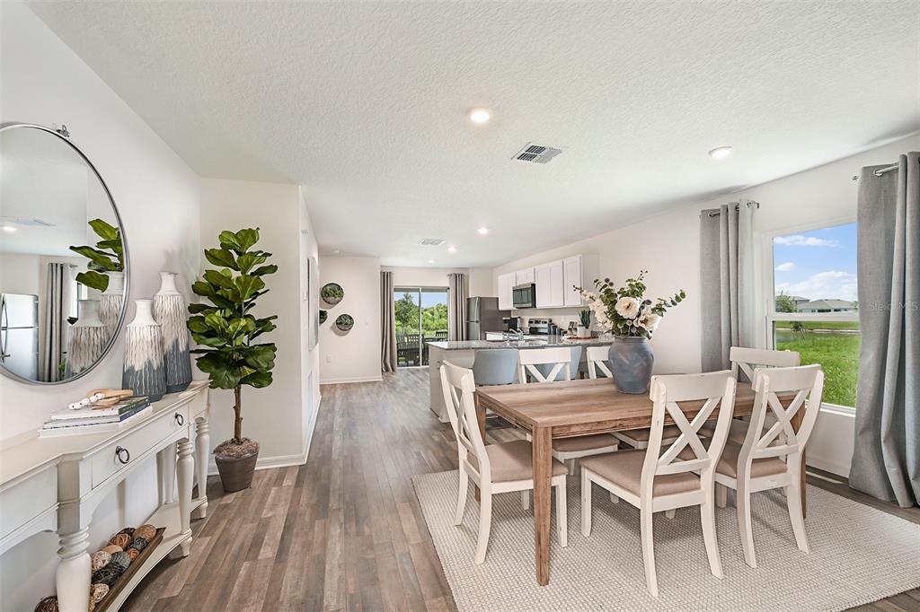 This is a floor plan for a single-story home with three bedrooms and a garage — 1745 EAGLE HAMMOCK BOULEVARD, EAGLE LAKE, FL