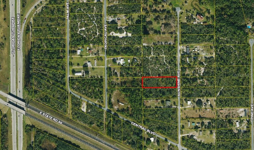 An aerial map view showing a rectangular property lot outlined in red near local roads — 0 SUNSHINE AVENUE, OKEECHOBEE, FL