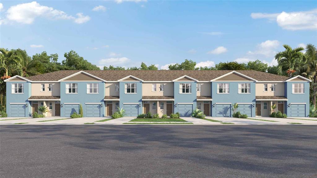 This is a digital rendering of a multi-unit townhouse building with blue siding and garages — 931 SPOTTED EGRET LOOP, RUSKIN, FL