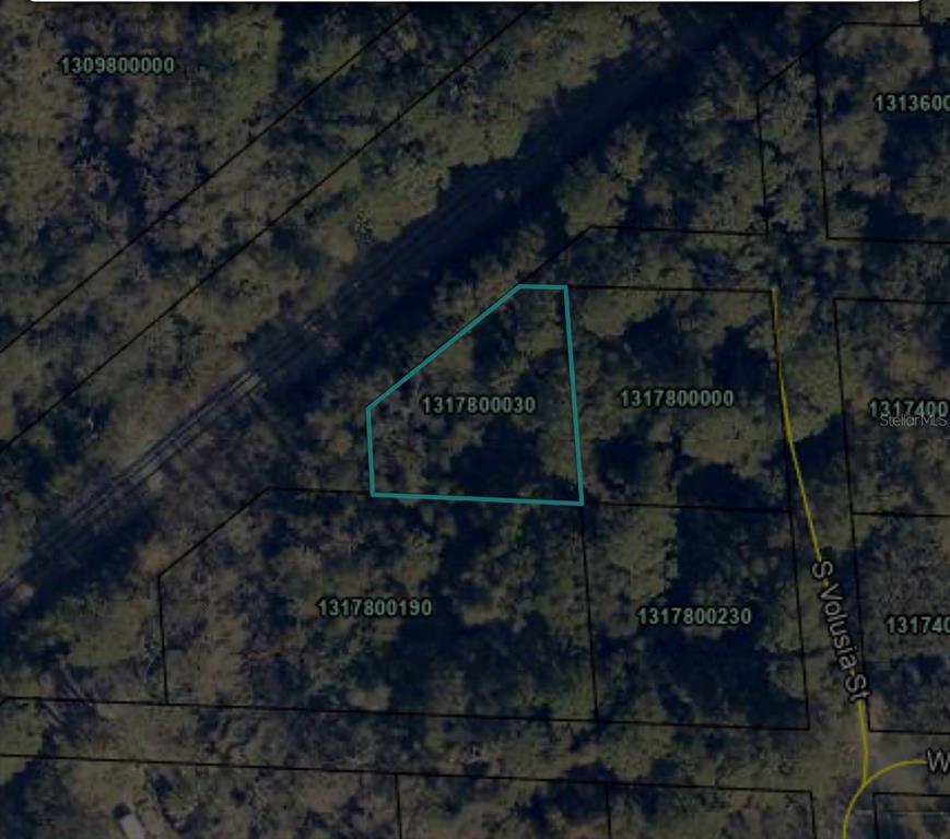 This is an aerial map showing a highlighted land parcel with property identification numbers — 900 W 3RD STREET, ST AUGUSTINE, FL