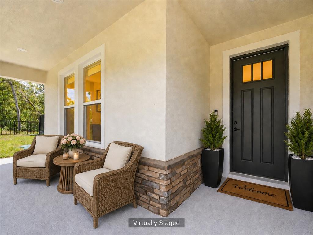A hallway with light wood floors, white walls, a console table, and a runner rug — 12326 DEEP CREEK DRIVE, SPRING HILL, FL