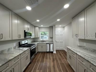 100 EL CAMINO DR UNIT 104, WINTER HAVEN, FL — photo 4 of 28