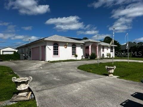 1529 SW KOSNAR AVENUE, PORT ST LUCIE, FL — photo 2 of 11