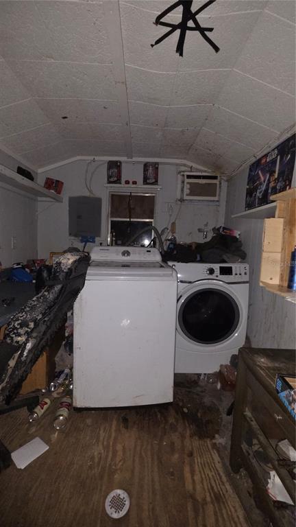 A utility room contains a top-load washer, front-load dryer, and an air conditioning unit — 3000 CLARCONA ROAD UNIT 510, APOPKA, FL