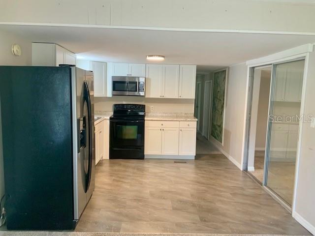 9775 SE 164TH PLACE, SUMMERFIELD, FL — photo 4 of 30