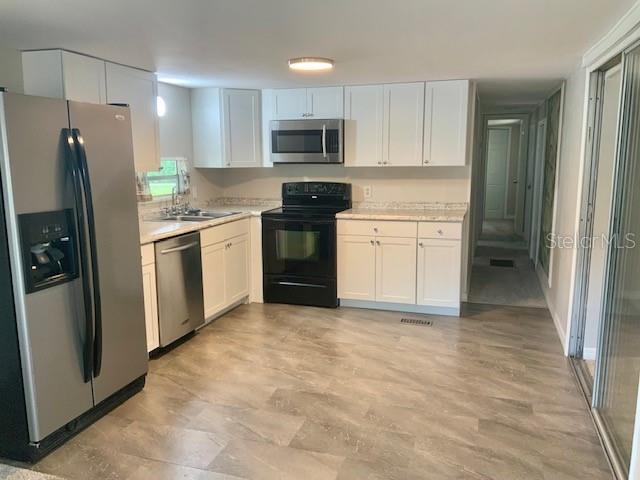 9775 SE 164TH PLACE, SUMMERFIELD, FL — photo 5 of 30