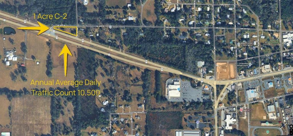 This aerial map shows a triangular one-acre parcel of land located near a highway intersection — 18450 NE 40TH STREET, WILLISTON, FL