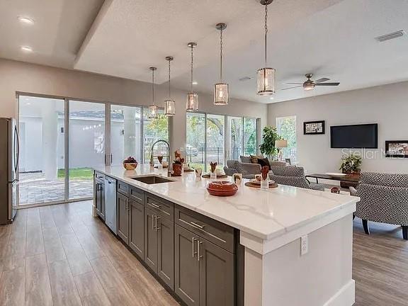 A modern two-story house with a blue front door and a covered porch — 200 E GRANT STREET, ORLANDO, FL