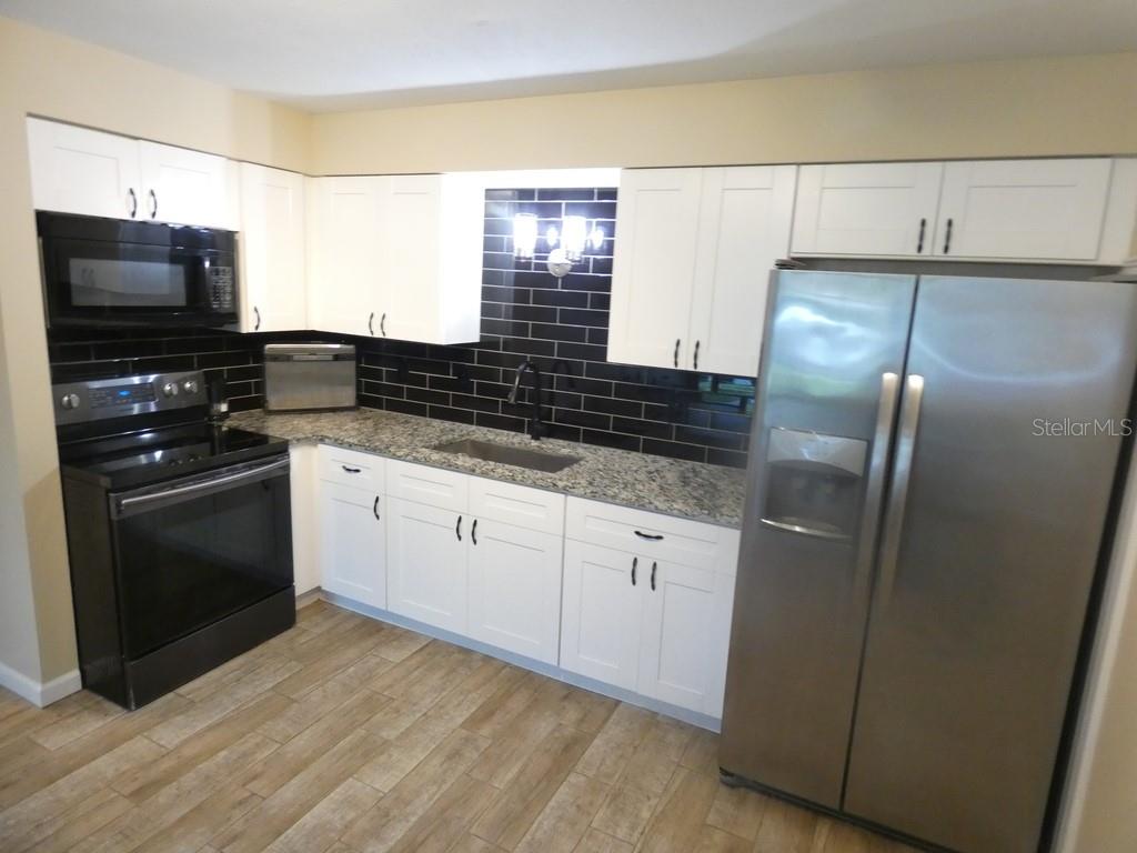 4322 TAHITIAN GARDENS CIRCLE UNIT B, HOLIDAY, FL — photo 3 of 36