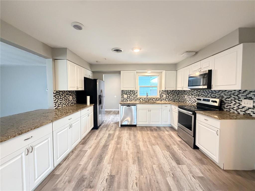 105 CARIB DRIVE, MERRITT ISLAND, FL — photo 5 of 25