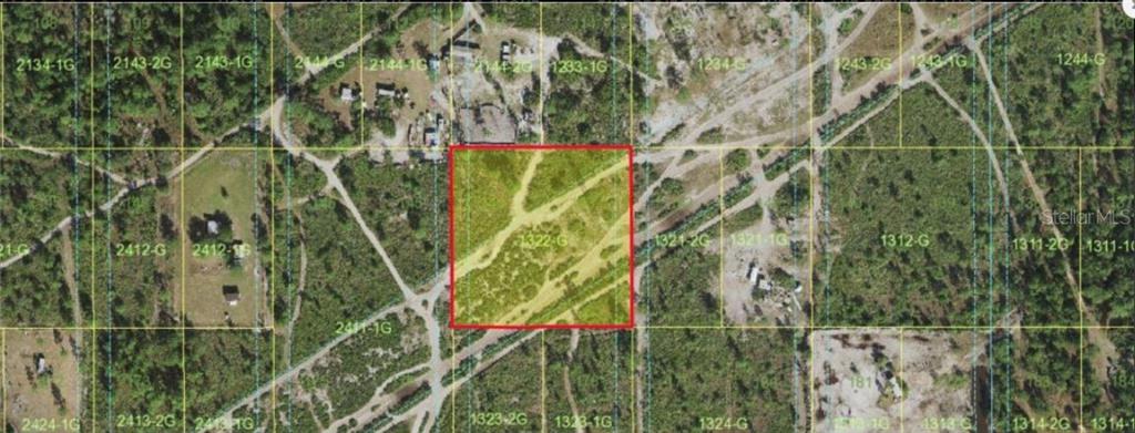 This aerial map shows a highlighted rectangular plot of land surrounded by rural terrain — HOLOPAW GROVES ROAD, ST CLOUD, FL