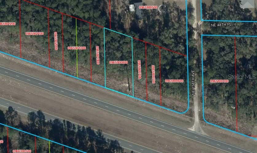 This is an aerial map showing property parcel boundaries and road layouts — Lot 9 NE 27A HIGHWAY, WILLISTON, FL