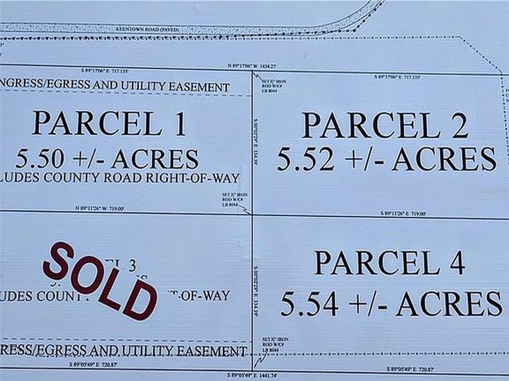 This is a survey map showing four parcels of land with their respective acreages — KEENTOWN ROAD, PARRISH, FL