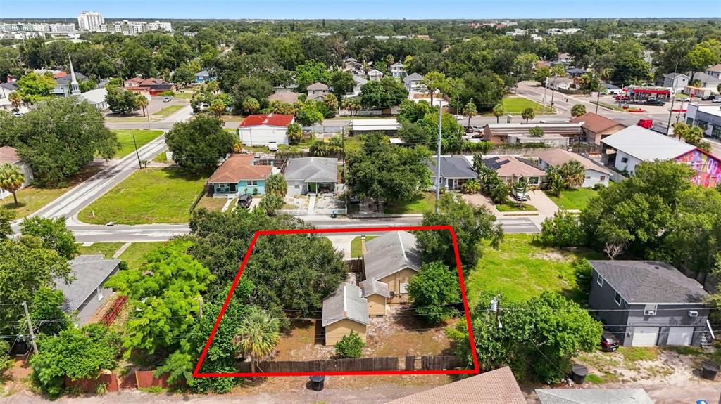 An aerial view shows a residential lot with a house and detached garage outlined in red — 2848 EMERSON AVENUE S, ST PETERSBURG, FL