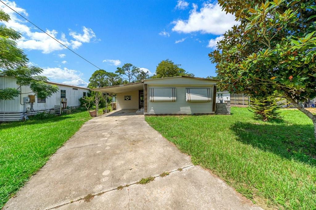 13337 WOODLAND DRIVE, ASTATULA, FL — photo 4 of 30