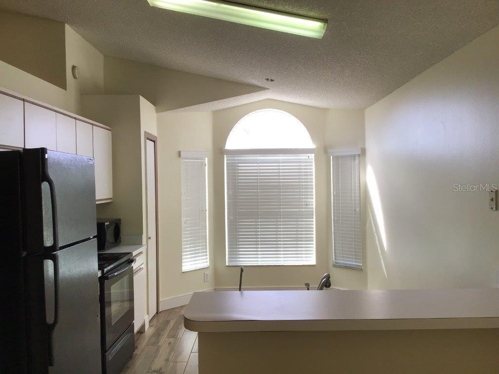 176 DAHLIA VILLAGE CIRCLE UNIT 96, ORLANDO, FL — photo 4 of 14