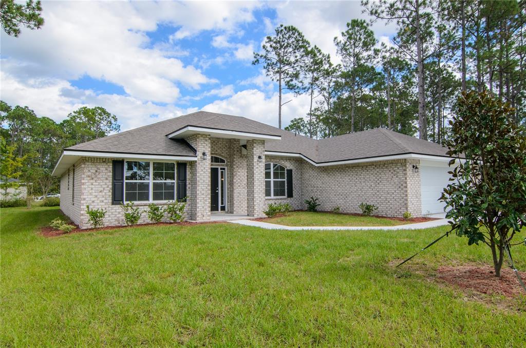 13 PRINCETON LANE, PALM COAST, FL — photo 2 of 26