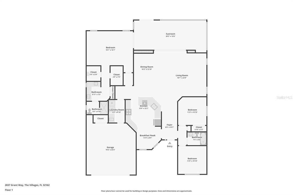 An entryway features a white cabinet, a patterned area rug, and a front door — 2837 GRANT WAY, THE VILLAGES, FL