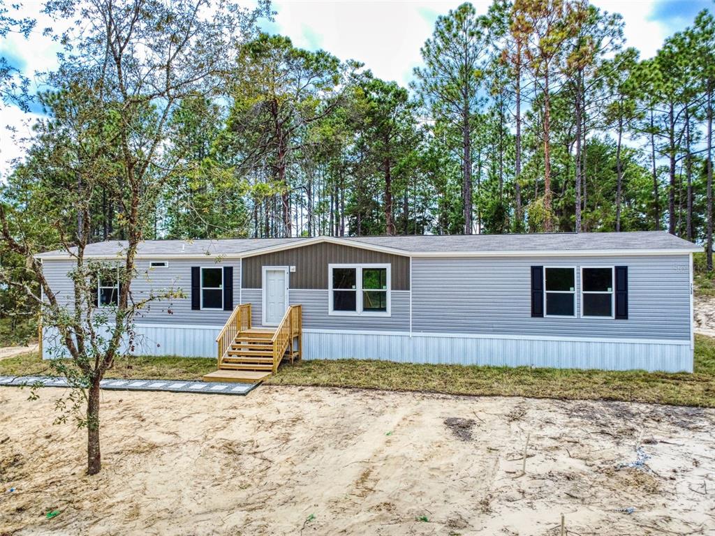 730 NE 131 AVENUE, WILLISTON, FL — photo 3 of 30