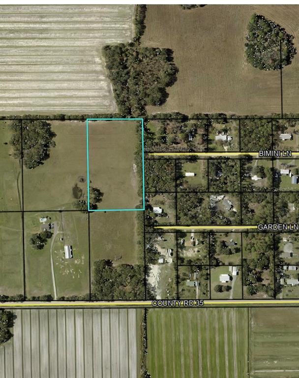 This is an aerial map showing a rectangular parcel of land outlined in light blue — N/A, BUNNELL, FL