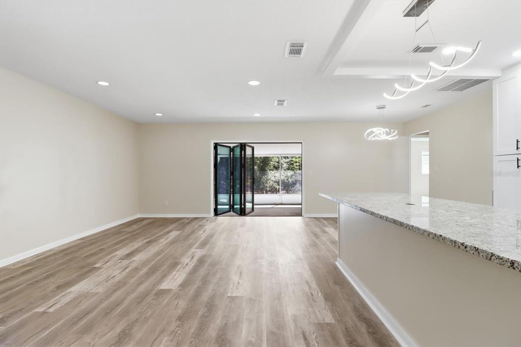 This is a floor plan showing the layout of a house with three bedrooms and a porch — 700 E STRATFORD ROAD, LECANTO, FL