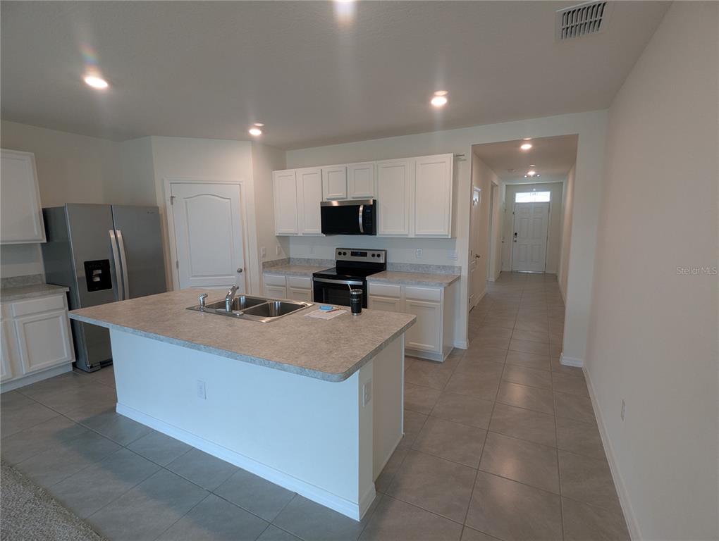 1903 HENIN CIRCLE, TAVARES, FL — photo 2 of 28