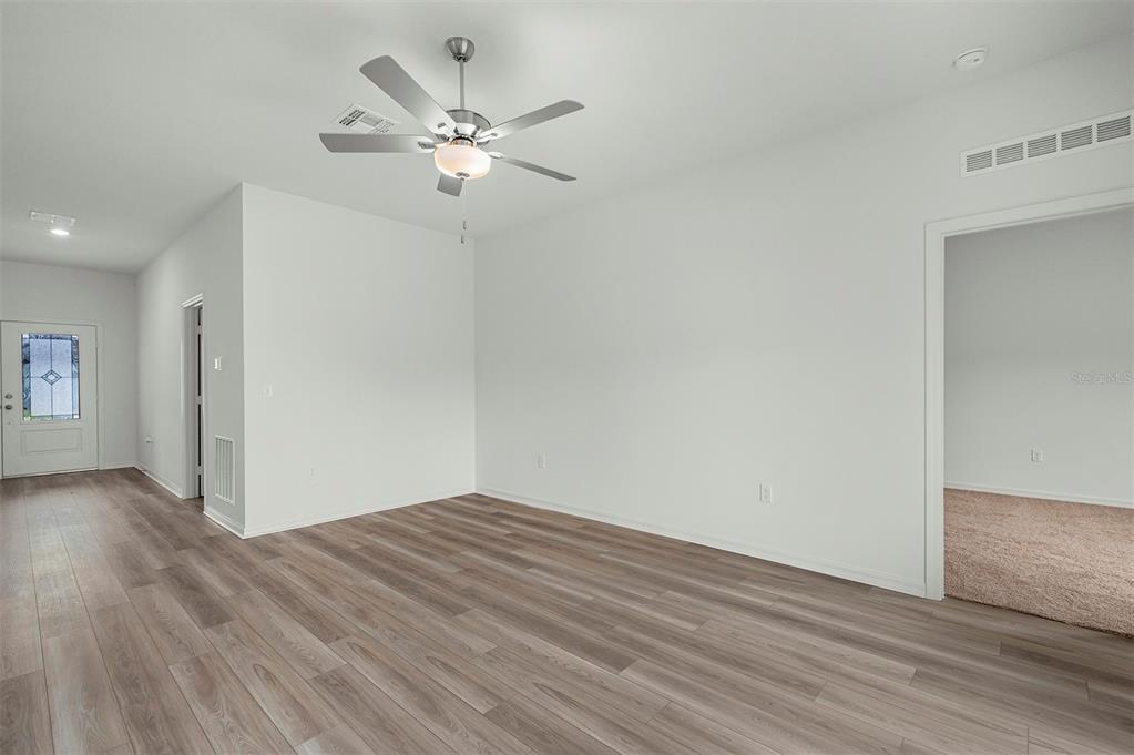 13359 TULA LOOP, ASTATULA, FL — photo 3 of 17
