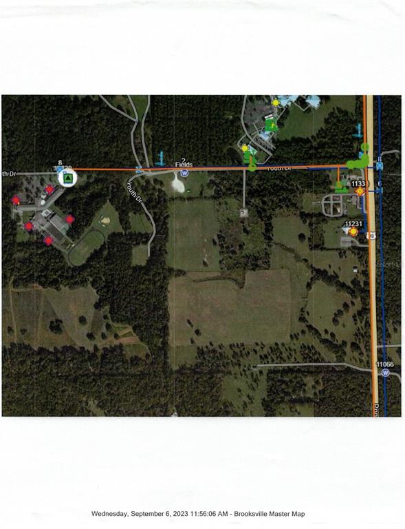 This is a satellite map showing roads, land parcels, and utility markers in Brooksville — 11077 PONCE DE LEON BOULEVARD, BROOKSVILLE, FL