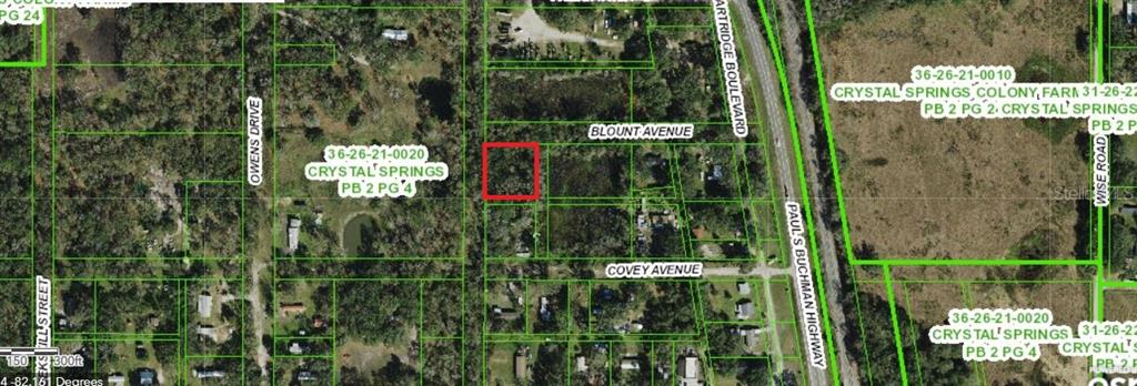 This is a satellite map showing a highlighted rectangular parcel of land — PARTRIGDE BOULEVARD, ZEPHYRHILLS, FL