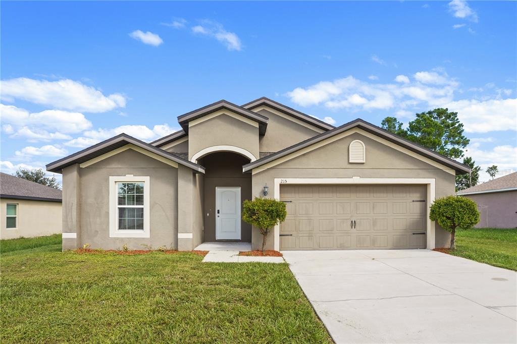 215 GOLDENROD LANE, POINCIANA, FL — photo 2 of 39