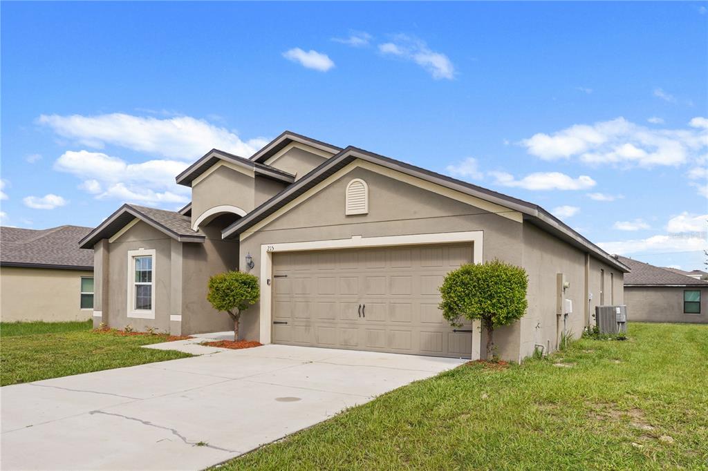 215 GOLDENROD LANE, POINCIANA, FL — photo 4 of 39