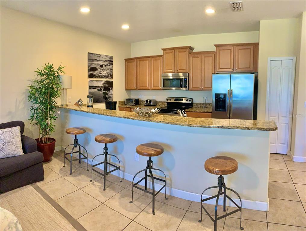 8921 CANDY PALM ROAD, KISSIMMEE, FL — photo 3 of 20