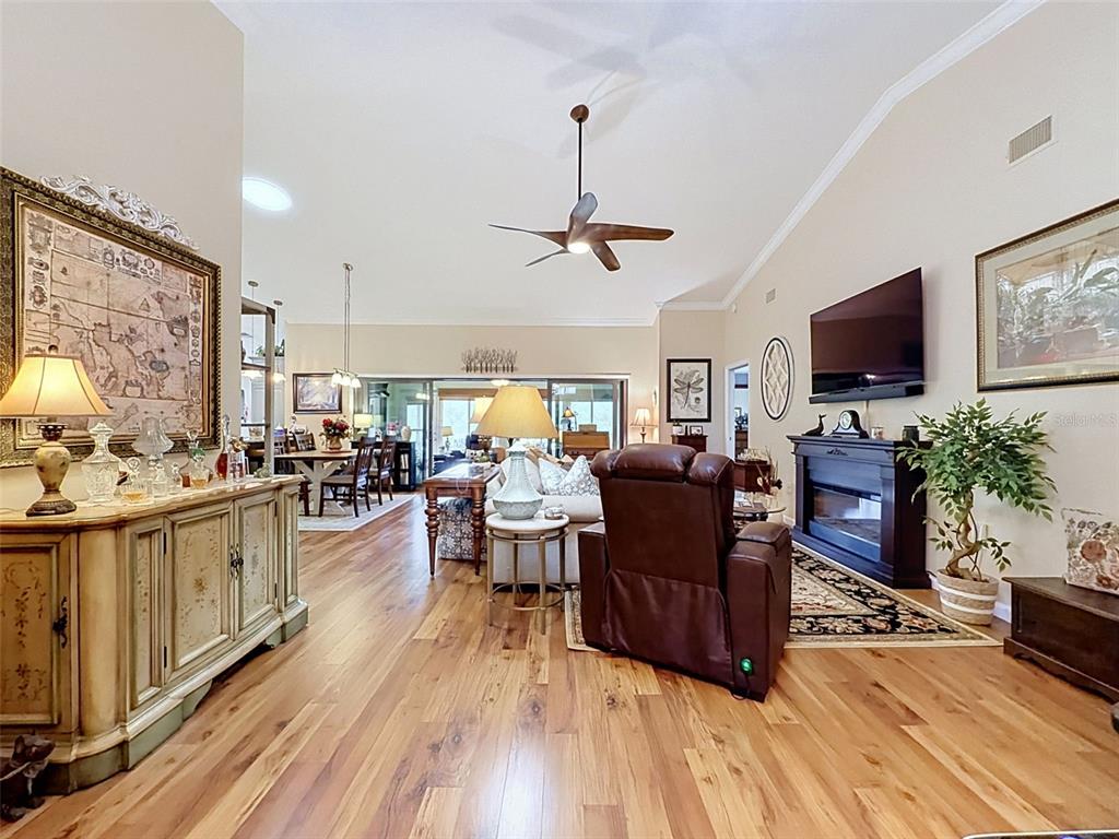 This is a floor plan for a single-story home with a garage and two porches — 18412 BENT PINE DRIVE, HUDSON, FL