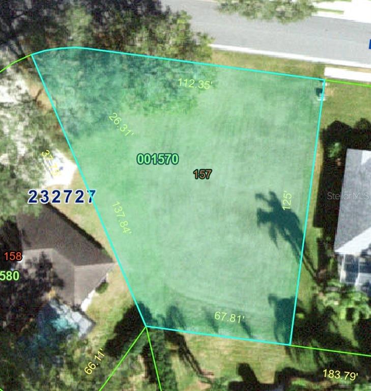 This is an aerial map showing a vacant residential lot with property boundary lines and dimensions — 2116 LONGLEAF CIRCLE, LAKELAND, FL