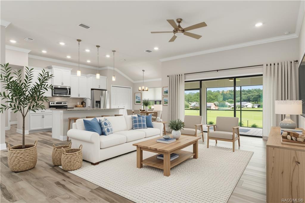 This is a rendering of an open-concept living room and kitchen with light wood flooring — 295 E CUMBERLAND COURT, HERNANDO, FL