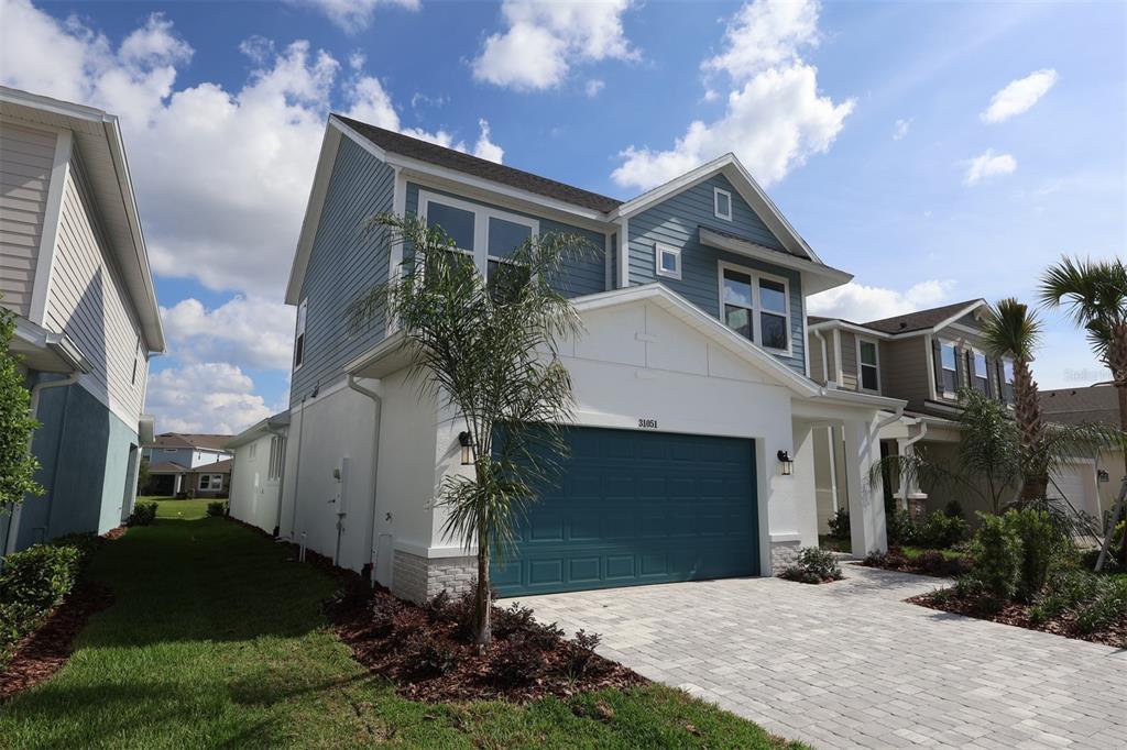 This is a floor plan showing two bedrooms, a bathroom, and a retreat area — 31051 PENDLETON LANDING CIRCLE, WESLEY CHAPEL, FL