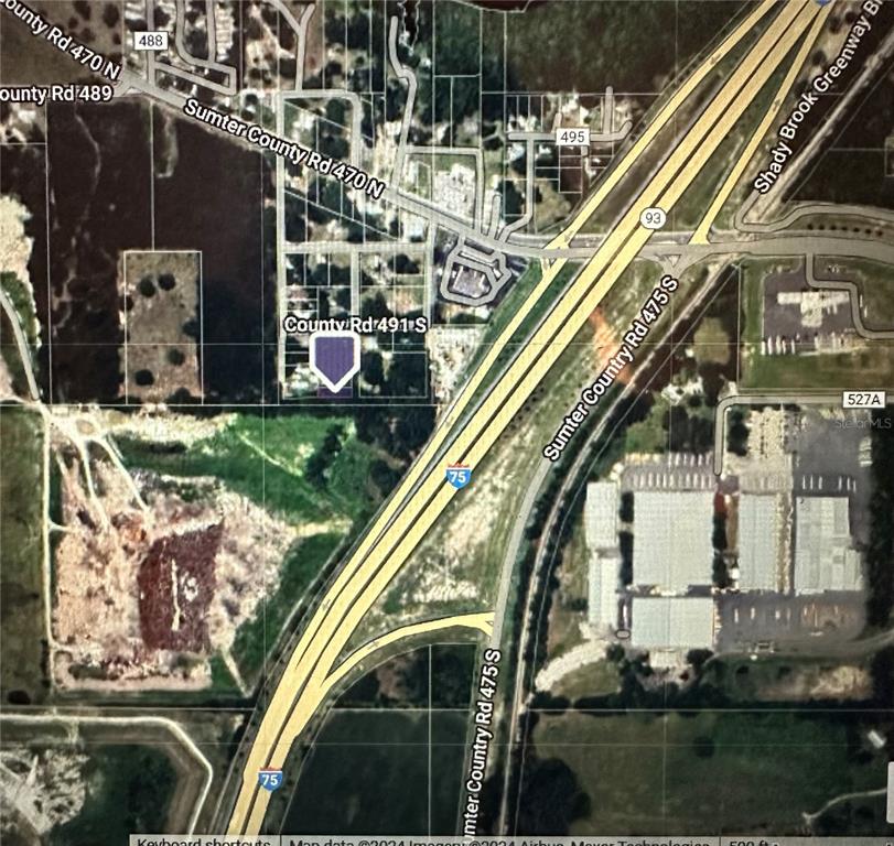 This is a satellite map showing a property lot highlighted in purple near Interstate 75 — LOT #6, LAKE PANASOFFKEE, FL