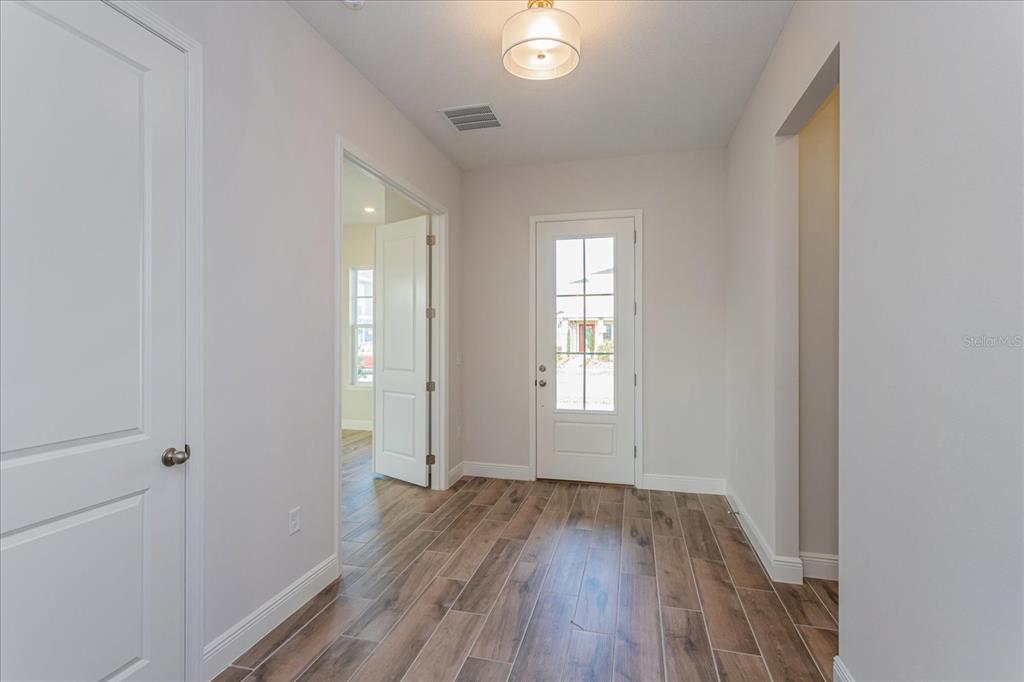10242 MEDAWAR STREET, ORLANDO, FL — photo 2 of 30